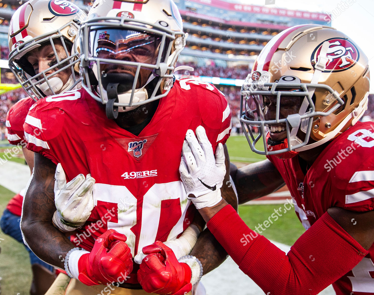 Santa Clara, California, USA. 17th Nov, 2019. San Francisco running back  Jeff Wilson (30)scores on a 25 yard touchdown reception celebrate with  teammate tight end Ross Dwelley (82) during the NFL Football