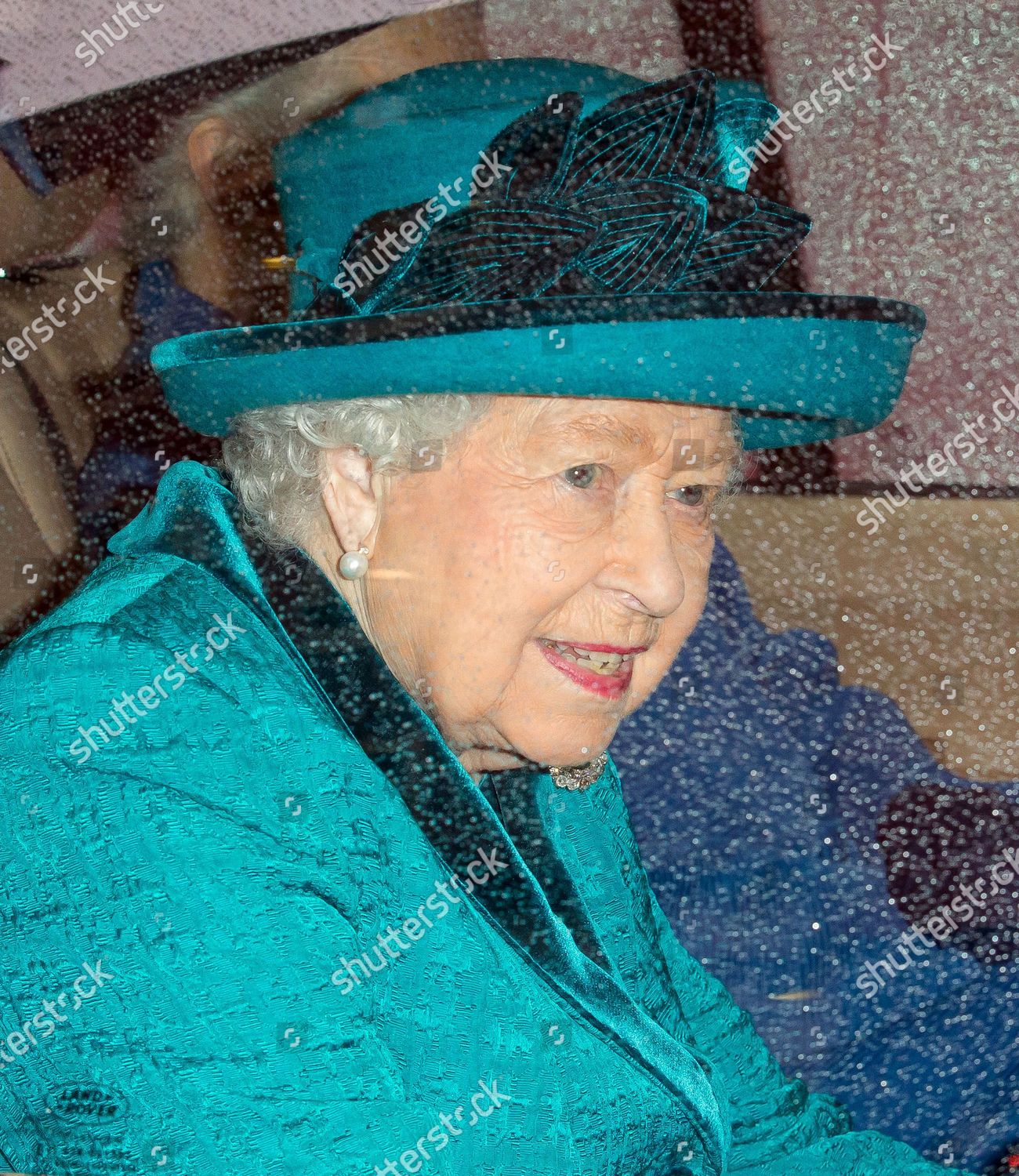queen-elizabeth-ii-visits-the-royal-philatelic-society-london-uk-shutterstock-editorial-10485457e.jpg