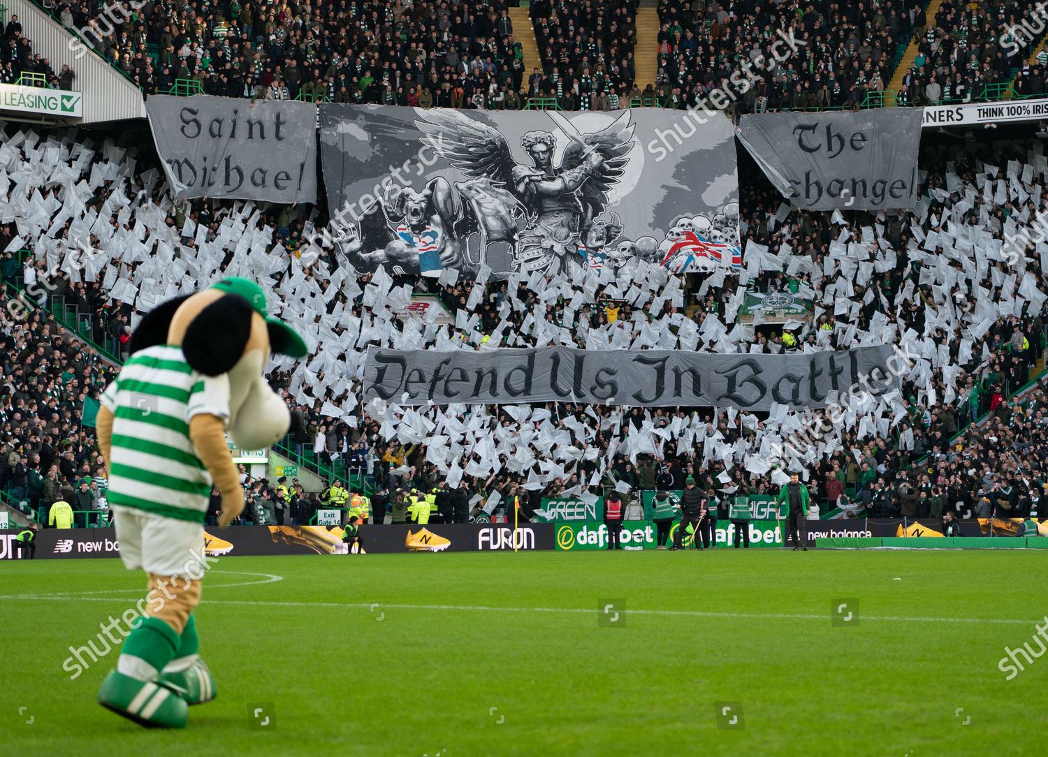 Celtic Fans Green Brigade Display Banners Depicting Editorial