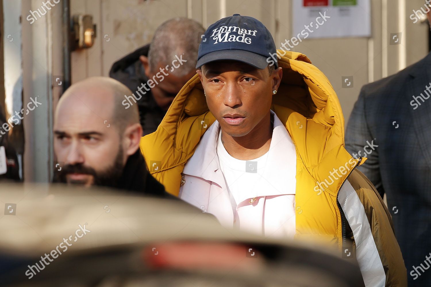 Pharrell Williams arriving at the Chanel show during Paris Fashion