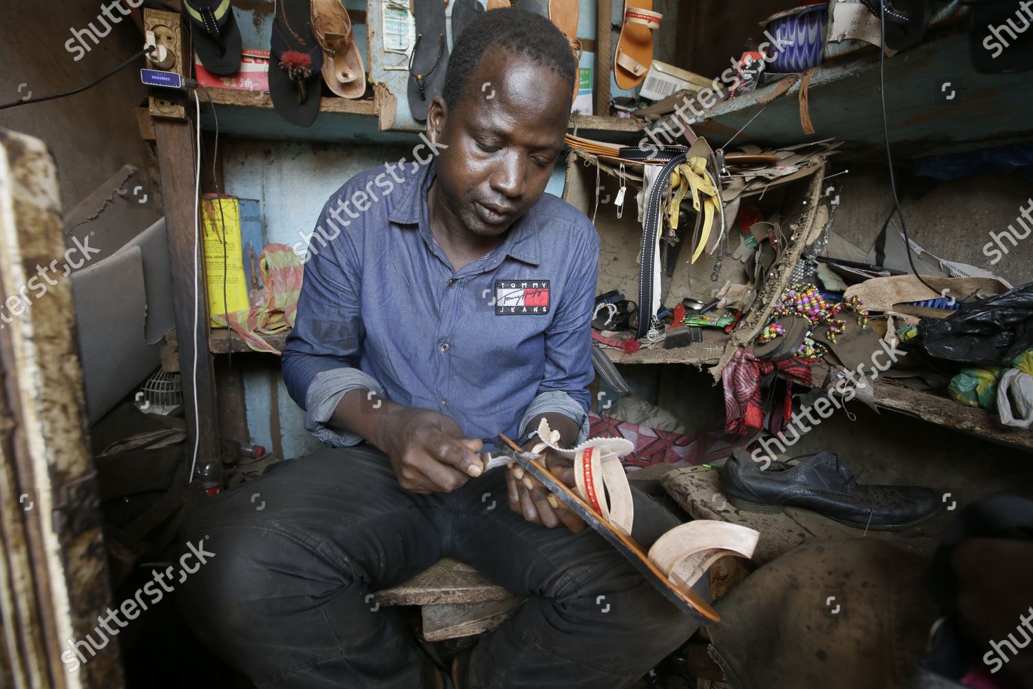 Local shoe maker repairer Ousman Keita 