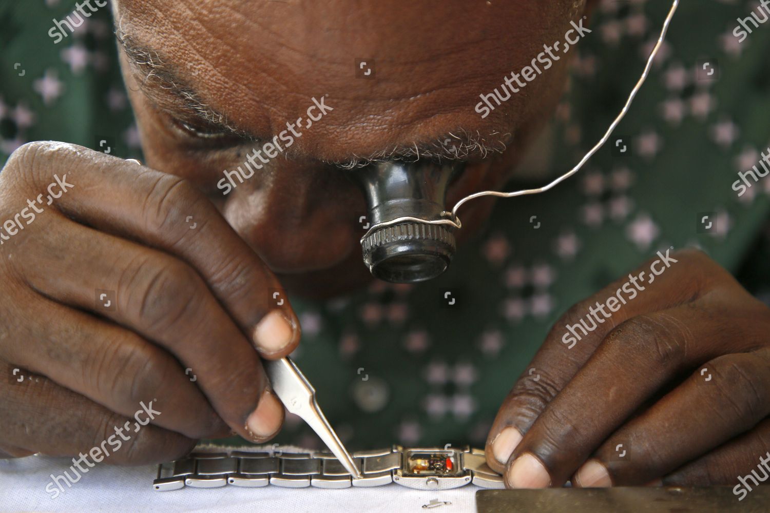 Seraphin Kouassi Kouadio Works On Watch Editorial Stock Photo Stock 