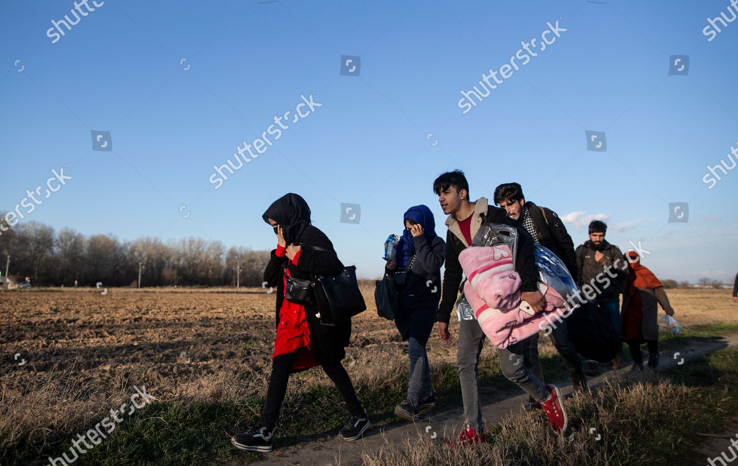 Refugees Walk Near Fences Enforcing Greek Editorial Stock Photo - Stock ...