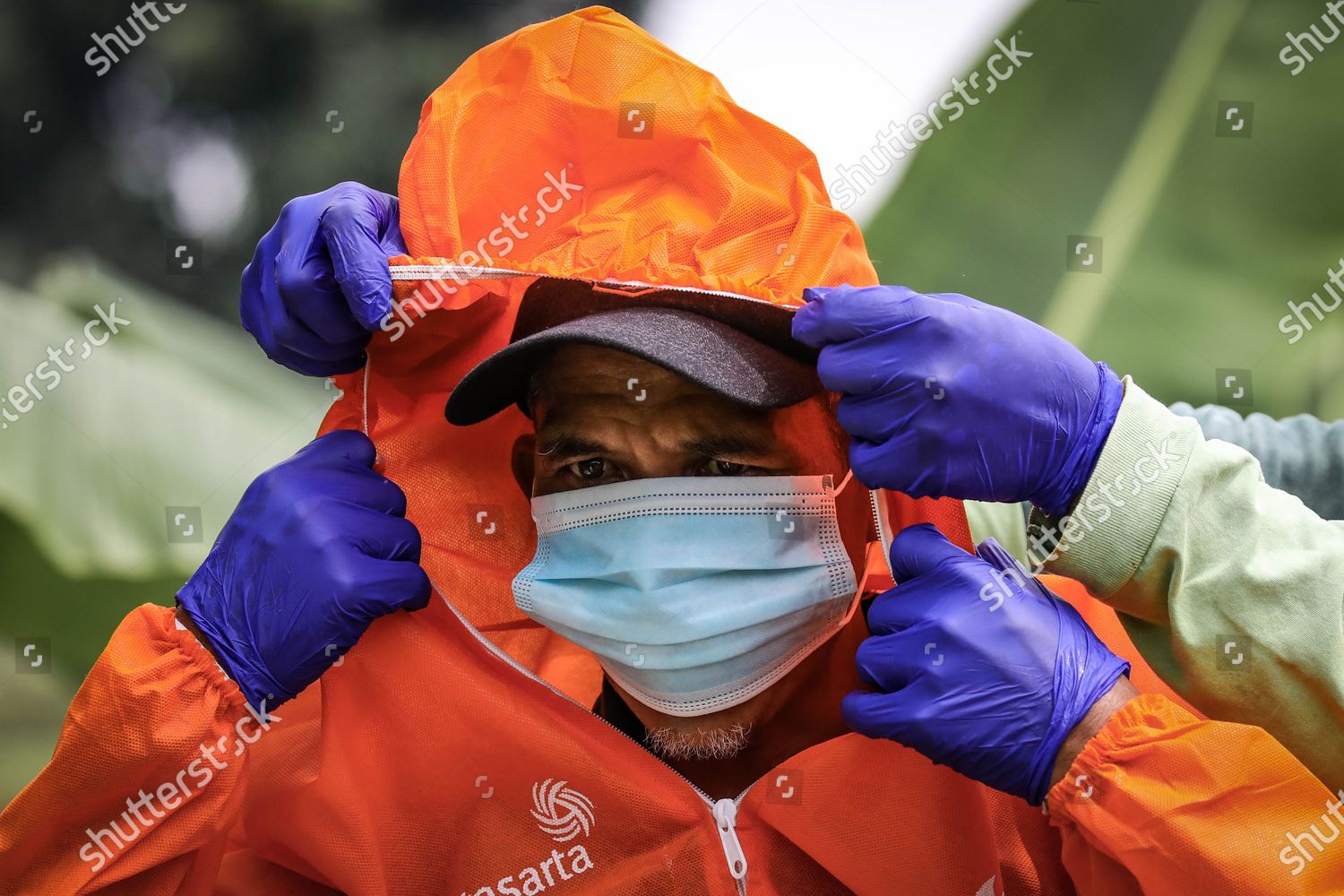 cemetery-worker-gets-sprayed-disinfectants-after-editorial-stock-photo