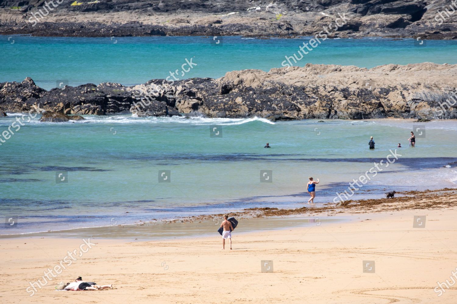People Enjoy Warm Weather Constantine Beach Editorial Stock Photo