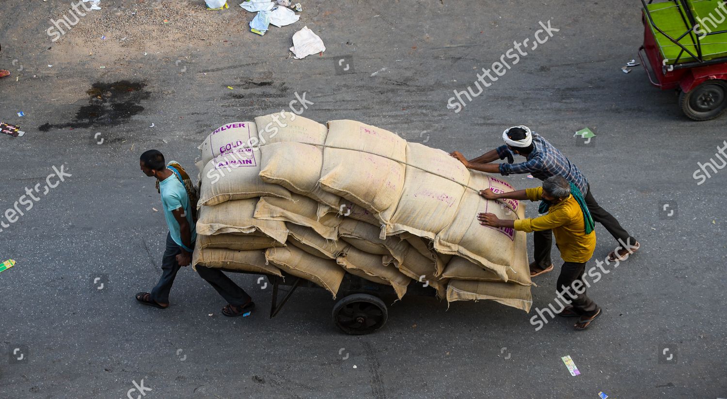 Workers Transport Sacks Parcels Piled On Editorial Stock Photo Stock