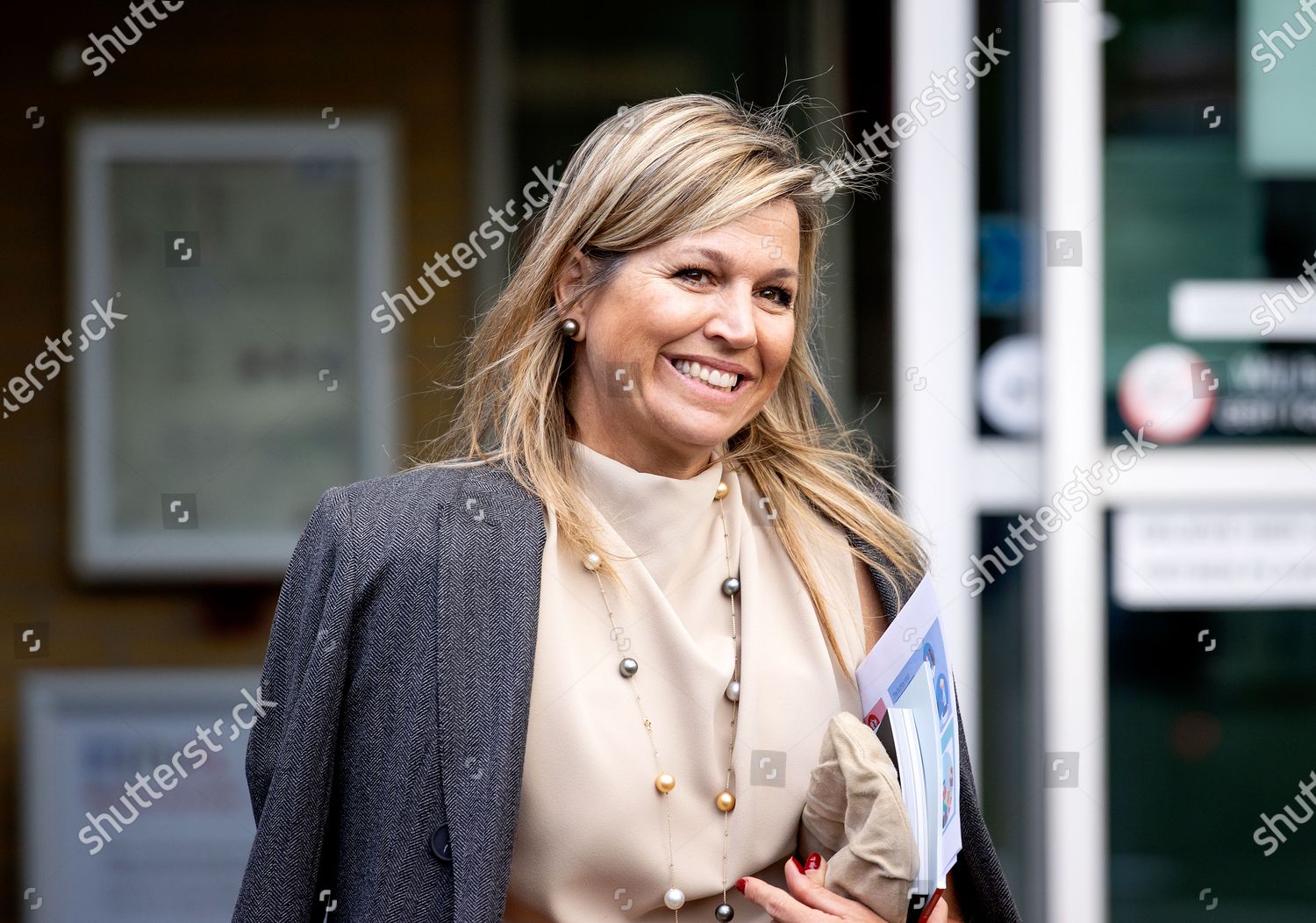queen-maxima-visit-to-the-parnassia-group-the-hague-the-netherlands-shutterstock-editorial-10675389y.jpg