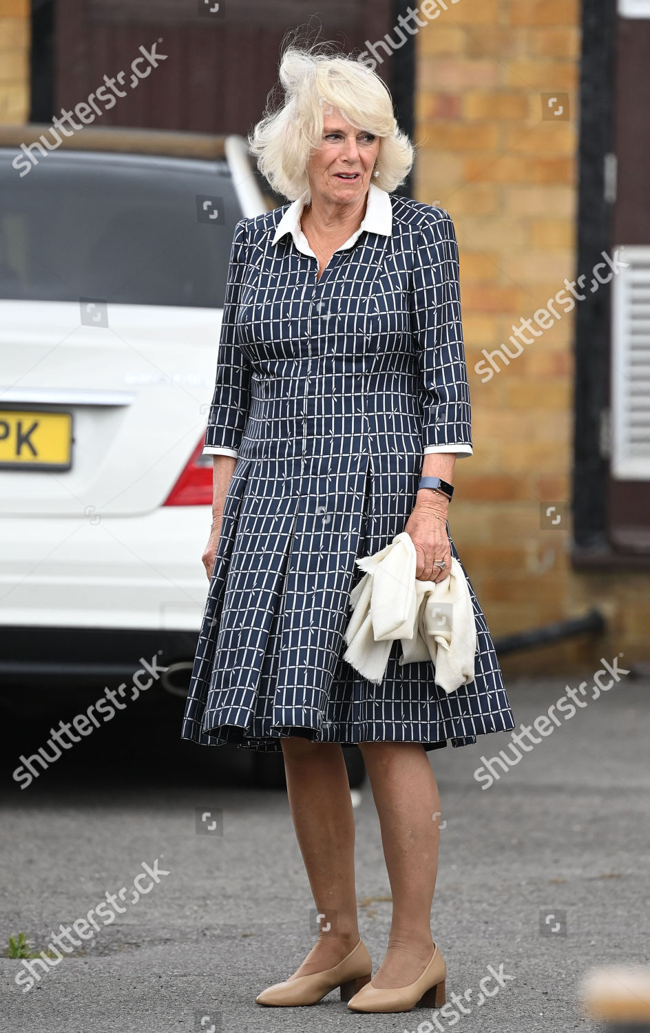 camilla-duchess-of-cornwall-visit-to-swindon-fire-station-and-swindon-borough-council-uk-shutterstock-editorial-10703208a.jpg