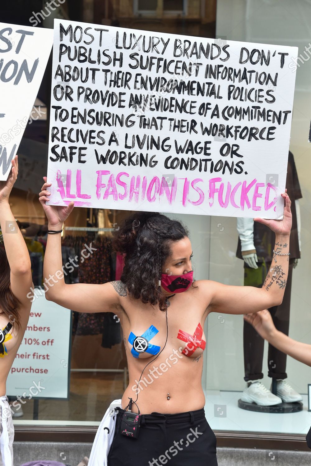 Naked Activist Holding Placard During Redress Editorial Stock Photo