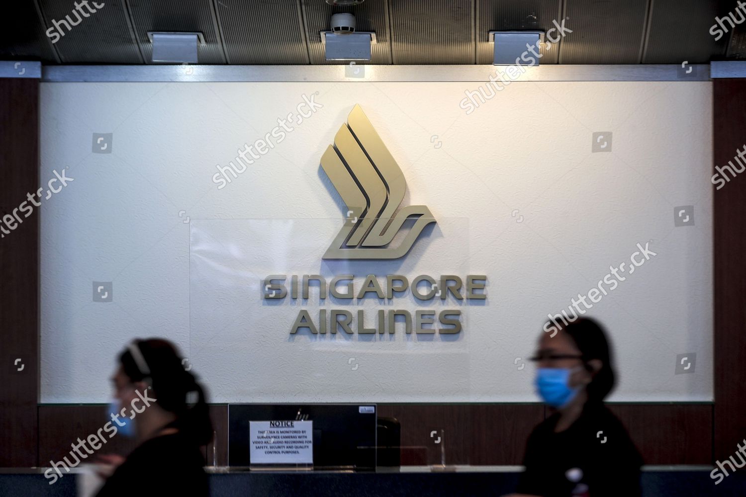 Two Women Walk Past Singapore Airlines Logo Editorial Stock Photo Stock Image Shutterstock