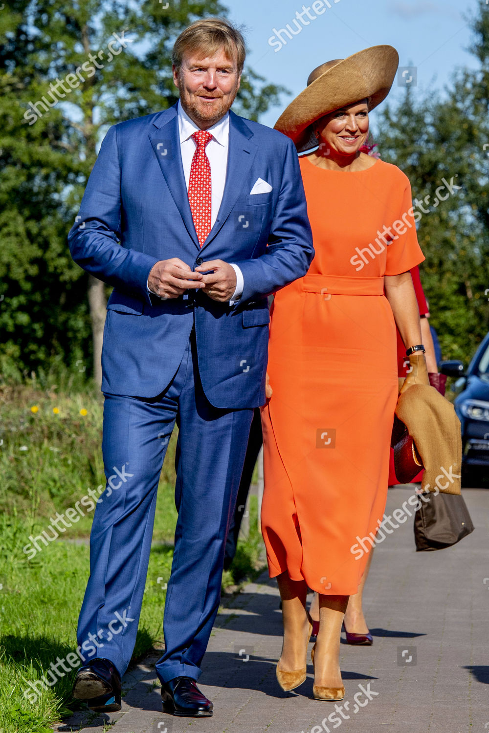 king-willem-alexander-and-queen-maxima-visit-to-ooststellingwerf-the-netherlands-shutterstock-editorial-10779750a.jpg