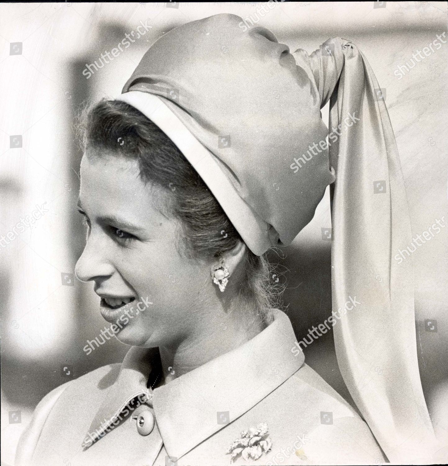 princess-anne-now-princess-royal-september-1970-princess-anne-at-heathrow-today-before-her-flight-to-bruggen-in-germany-princess-anne-was-wearing-yellow-satin-coat-and-matching-hat-with-two-long-tails-royalty-shutterstock-editorial-1100812a.jpg
