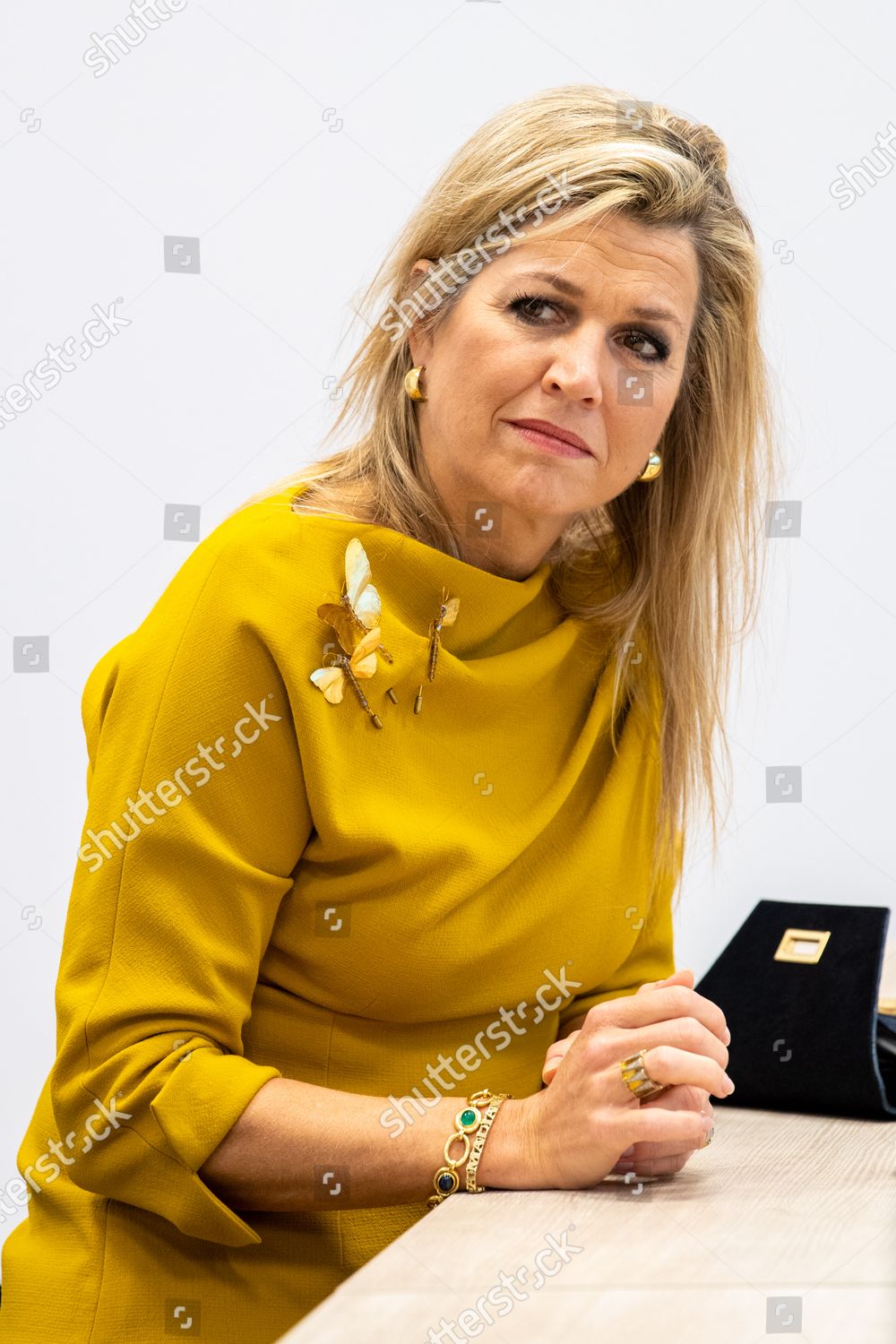queen-maxima-visits-a-residential-care-location-noordwijk-the-netherlands-shutterstock-editorial-11014774r.jpg