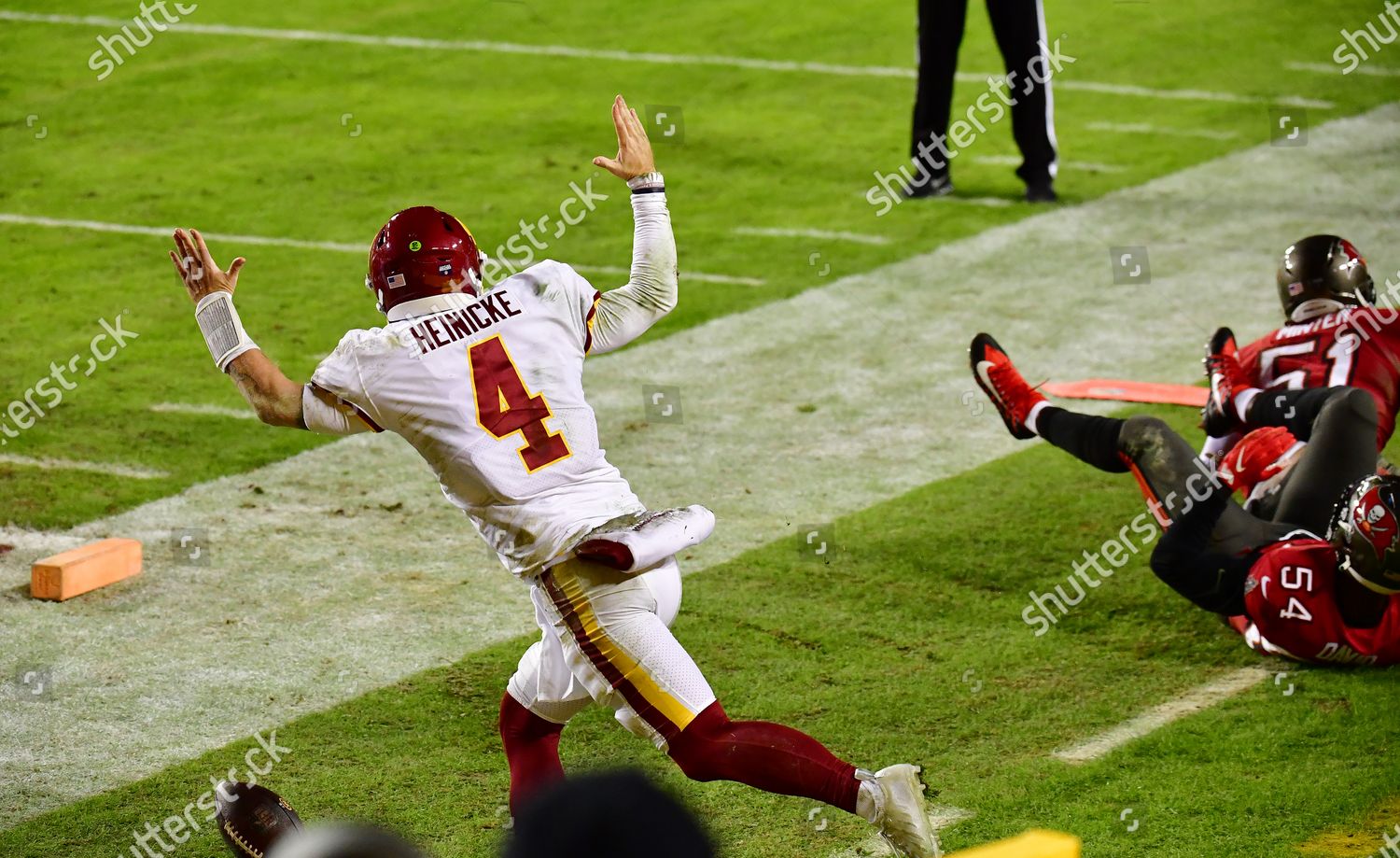 Landover, United States. 27th Dec, 2020. Washington Football Team  quarterback Taylor Heinicke reacts as they play the Carolina Panthers, at  FedEx Field in Landover, Maryland on Sunday, December 27, 2020. The Panthers