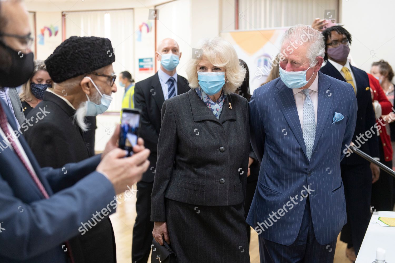 prince-charles-and-camilla-duchess-of-cornwall-visit-vaccination-pop-up-centre-at-finsbury-park-mosque-london-uk-shutterstock-editorial-11802378ai.jpg