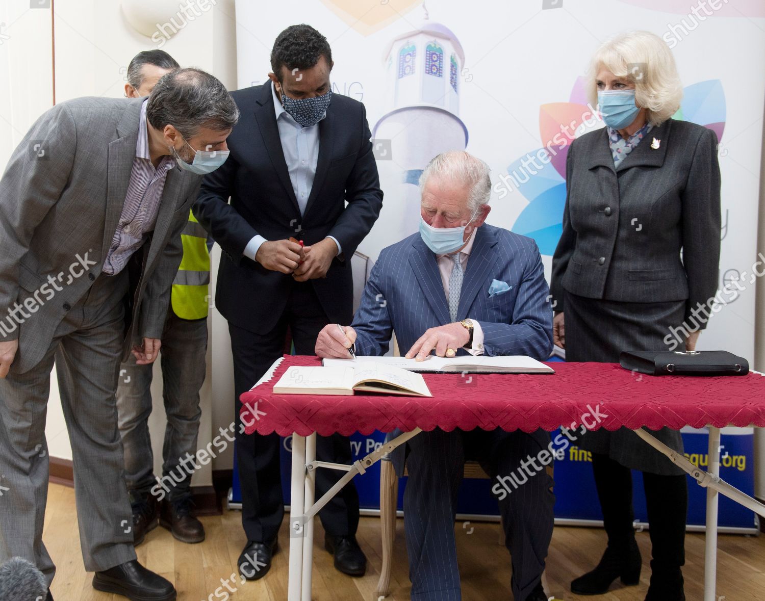 prince-charles-and-camilla-duchess-of-cornwall-visit-vaccination-pop-up-centre-at-finsbury-park-mosque-london-uk-shutterstock-editorial-11802378k.jpg