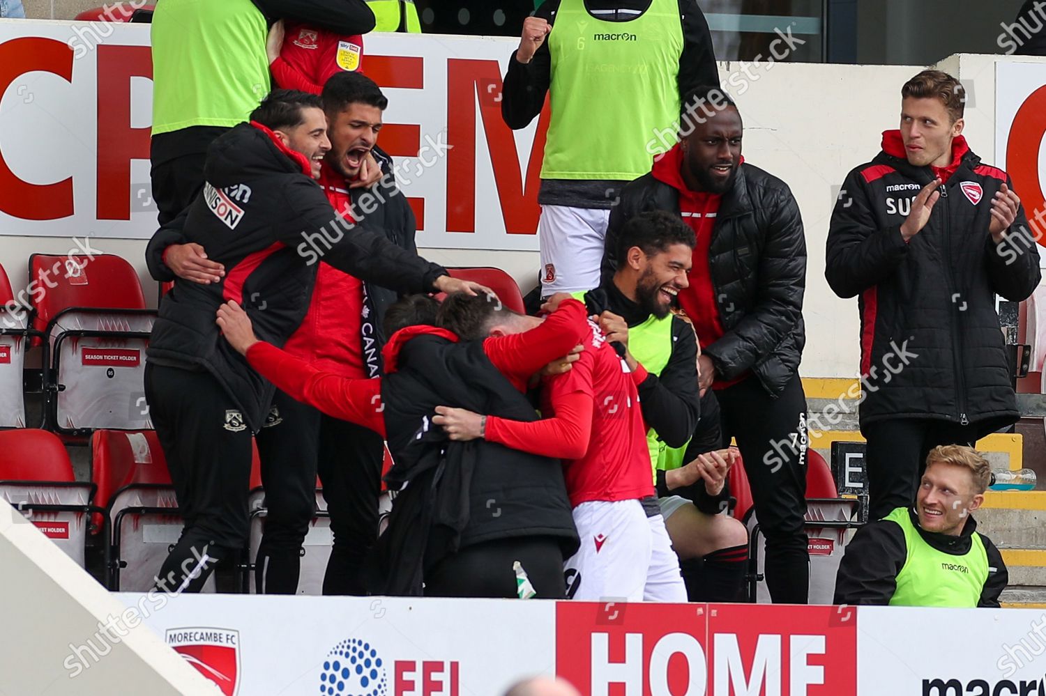 Morecambe Players Celebrate Final Whistle During Editorial Stock Photo