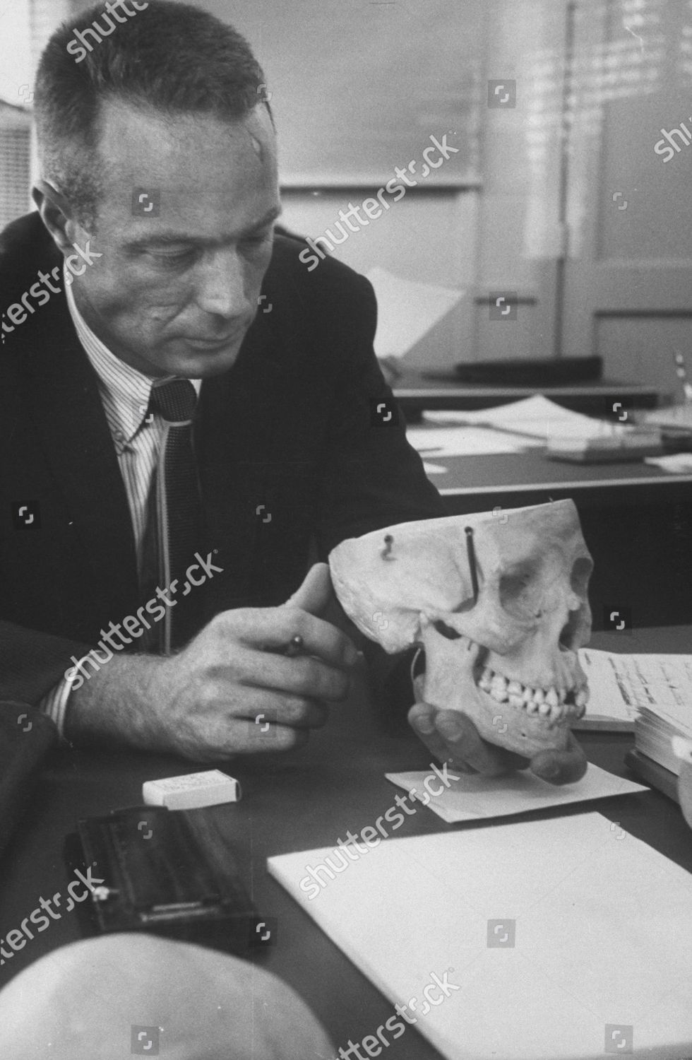 Astronaut Malcolm S Carpenter Examining Skull Editorial Stock Photo