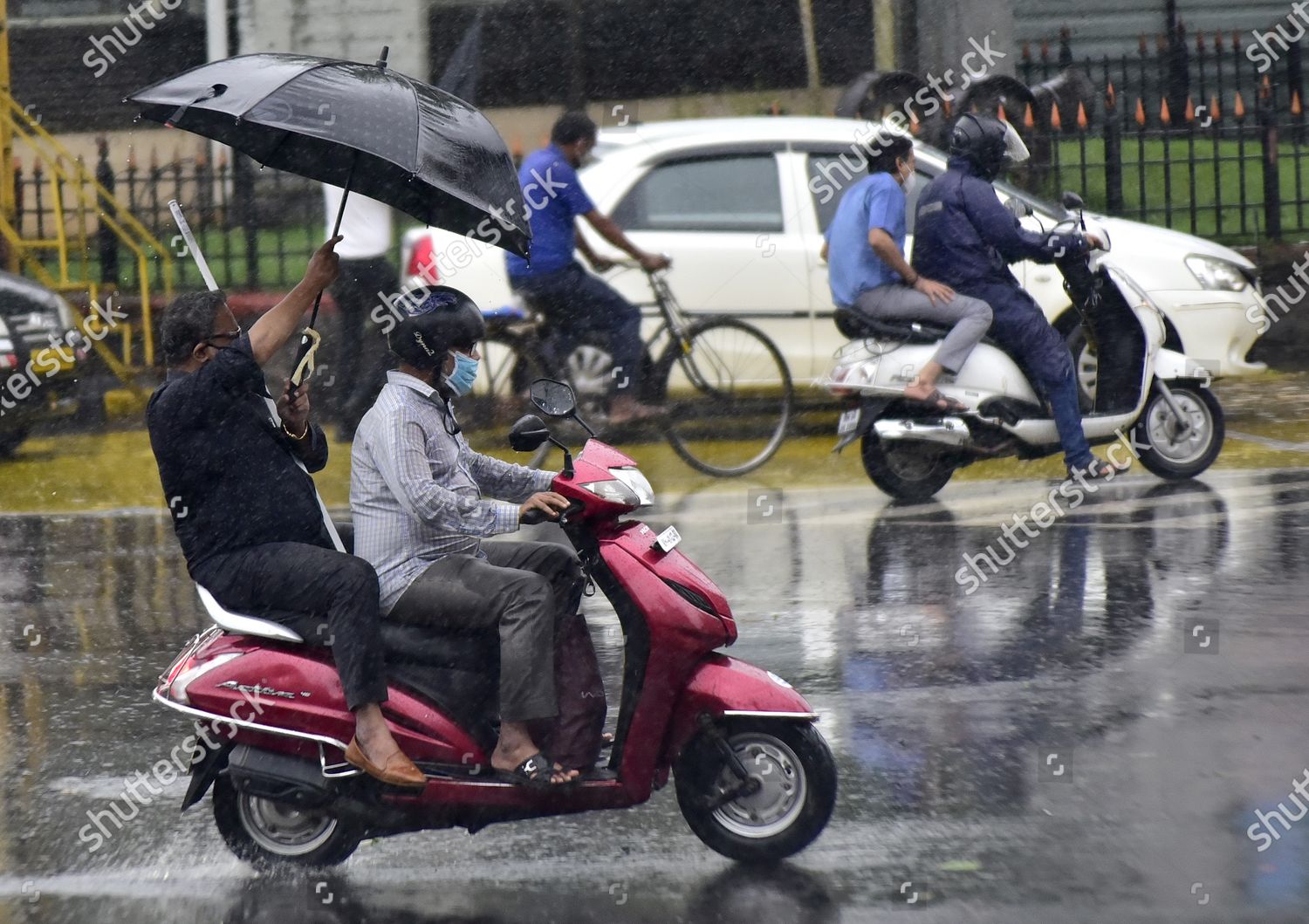 Pillion Rider Covers Rider Rain By Editorial Stock Photo - Stock Image ...