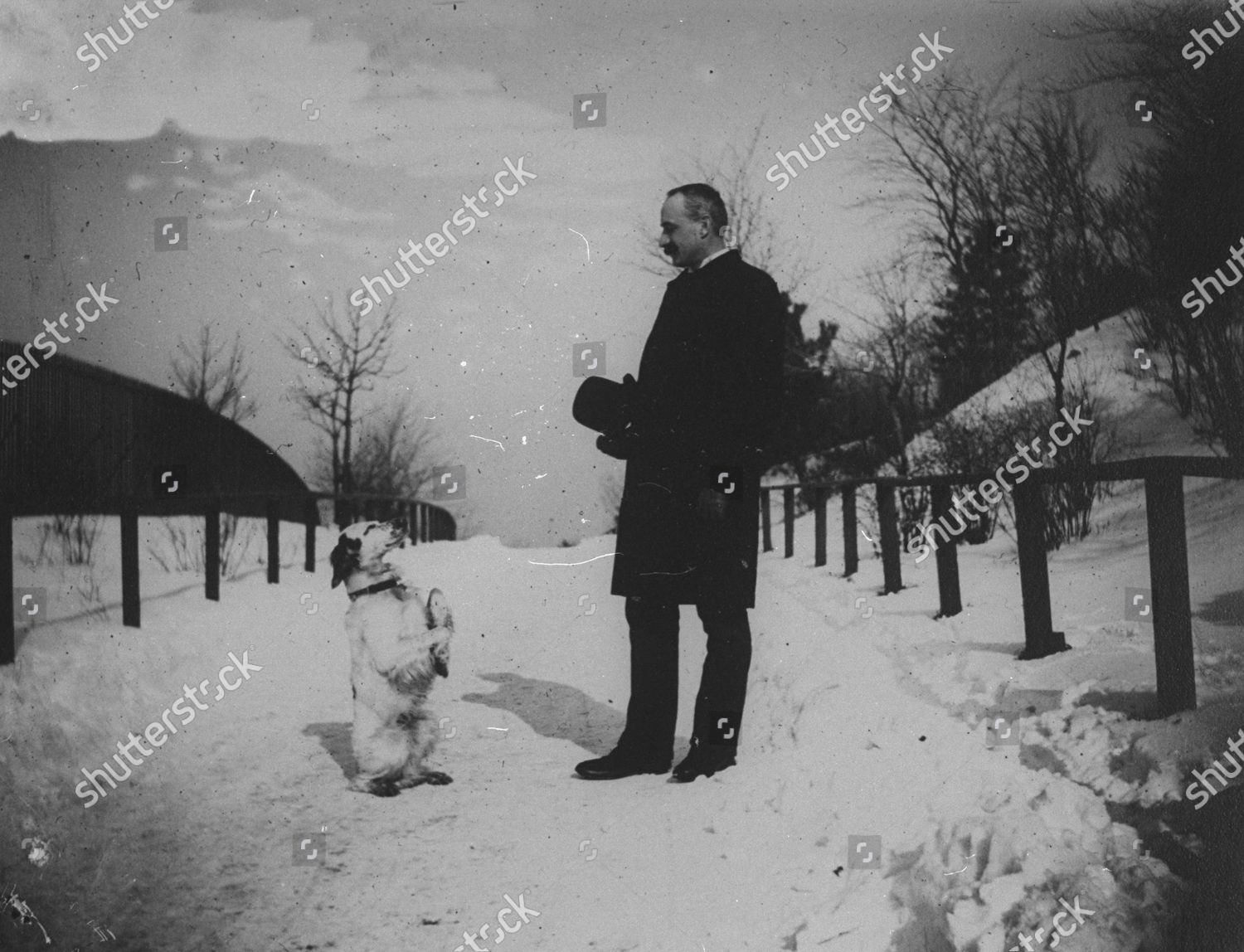 welldressed-man-his-dog-standing-attention-editorial-stock-photo