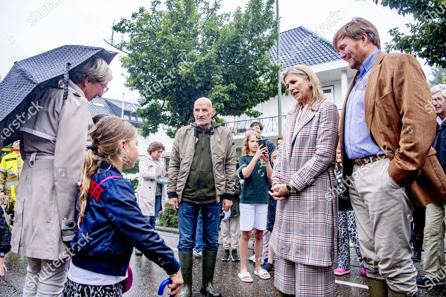 CASA REAL HOLANDESA - Página 20 King-willem-alexander-and-queen-maxima-visit-flooded-region-valkenburg-aan-de-geul-netherlands-shutterstock-editorial-12216250e