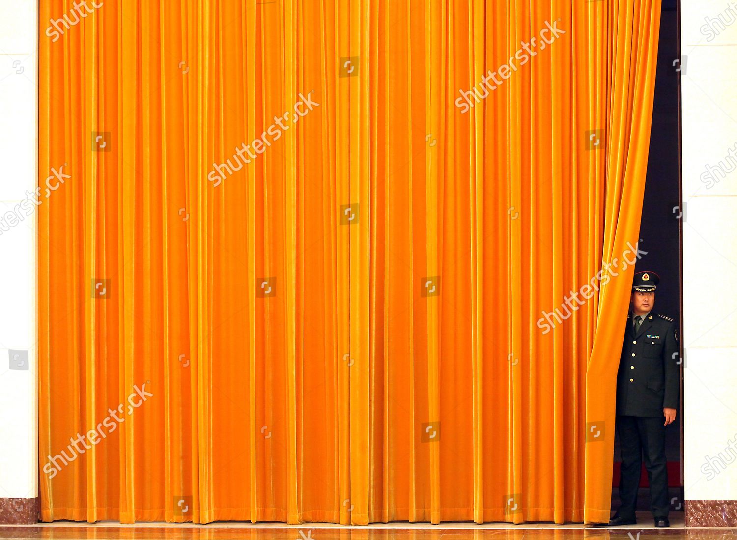 chinese-soldier-peers-out-behind-massive-editorial-stock-photo-stock