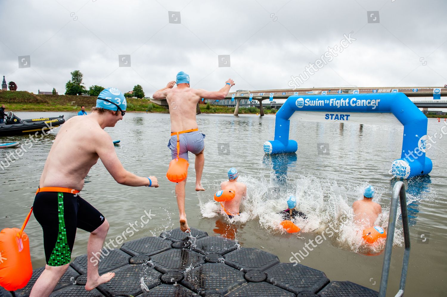 Group People Jumping Into Water During Editorial Stock Photo Stock