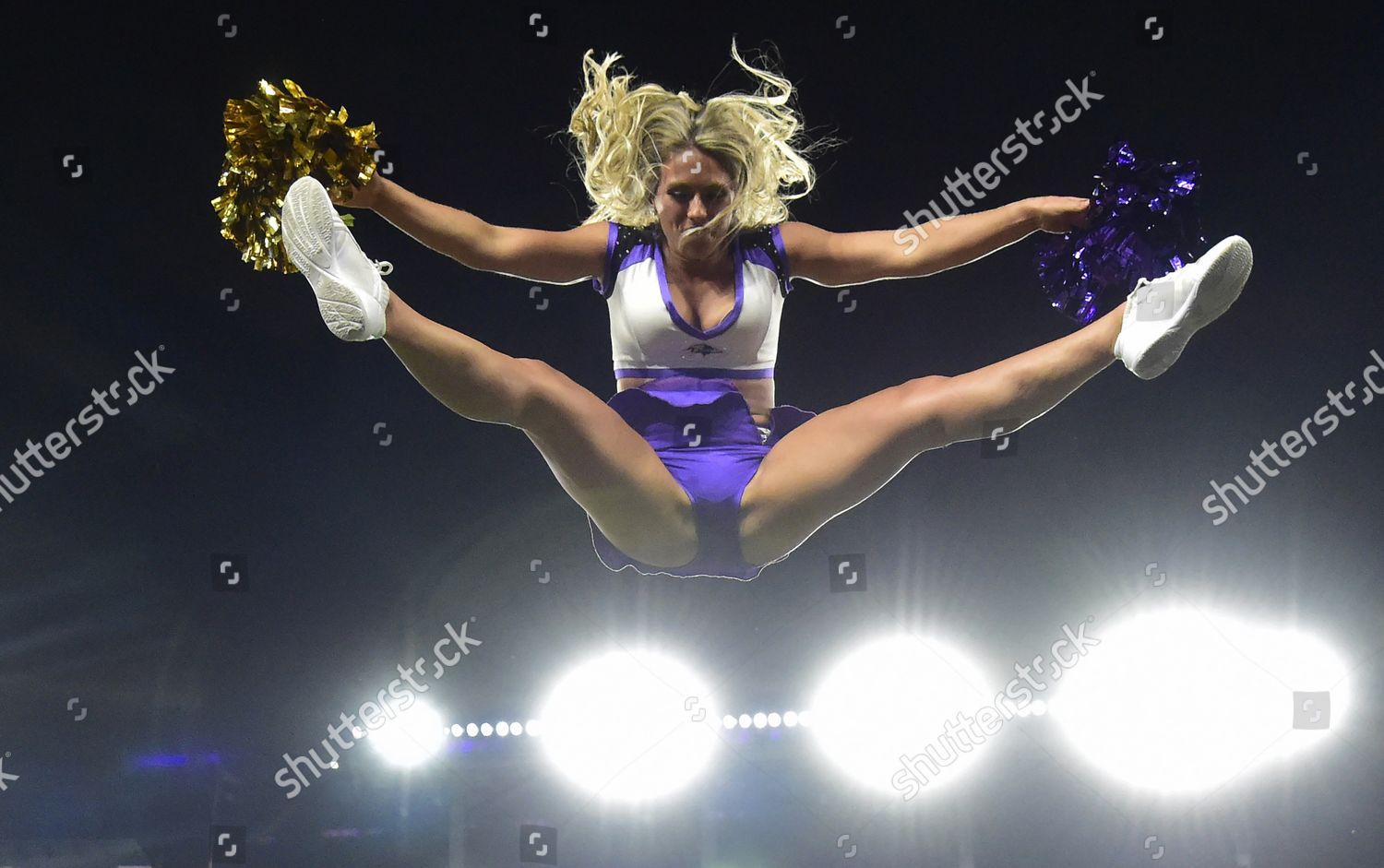 Baltimore, United States. 19th Sep, 2021. Baltimore Ravens cheerleaders  return to the field after a year off because of the coronavirus pandemic  during the home opener against the Kansas City Chiefs at