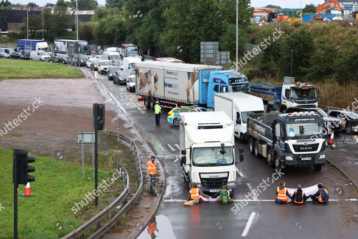 Climate protest group Insulate Britain block M1 Photos ...