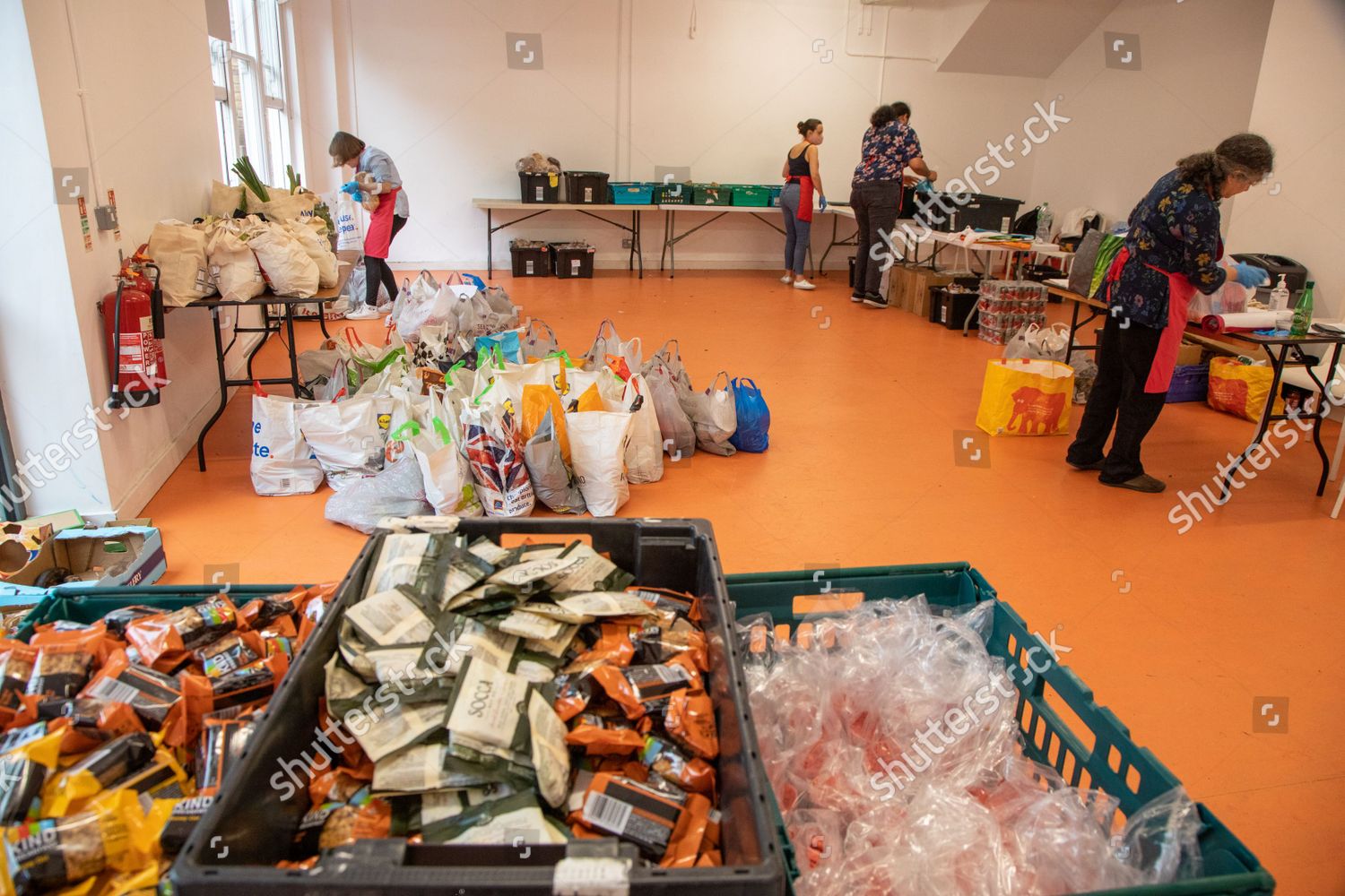 volunteers-food-bank-sorting-crates-donated-editorial-stock-photo