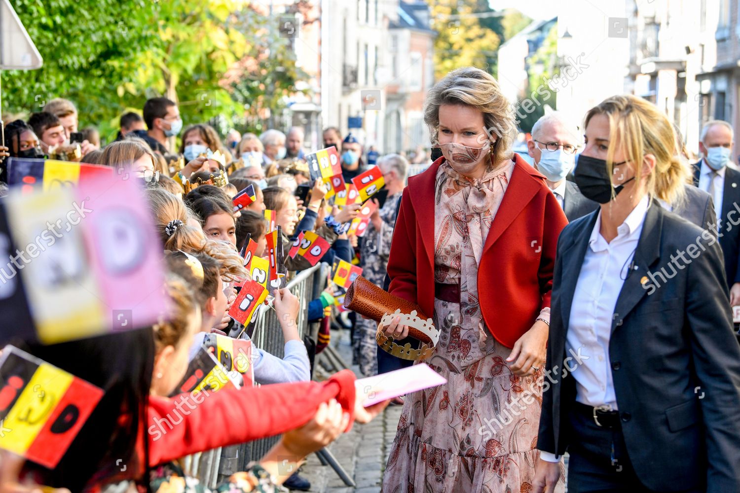 queen-mathilde-and-king-philippe-visit-the-province-of-luxembourg-vielsalm-belgium-shutterstock-editorial-12529850ai.jpg