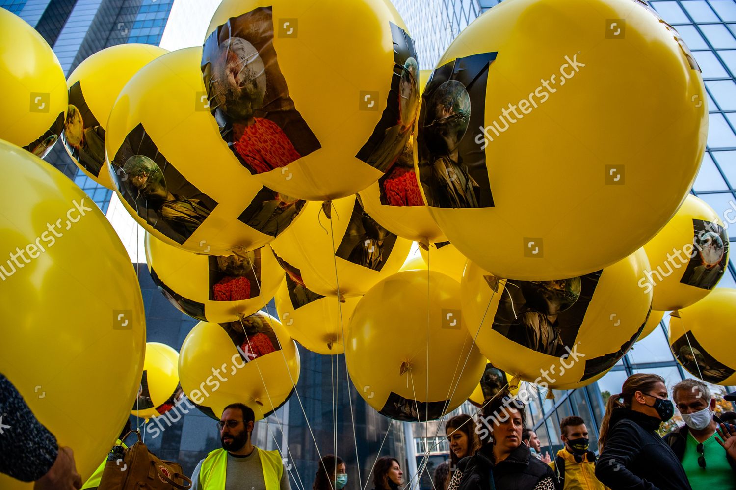 protesters-hold-yellow-balloons-during-demonstration-editorial-stock