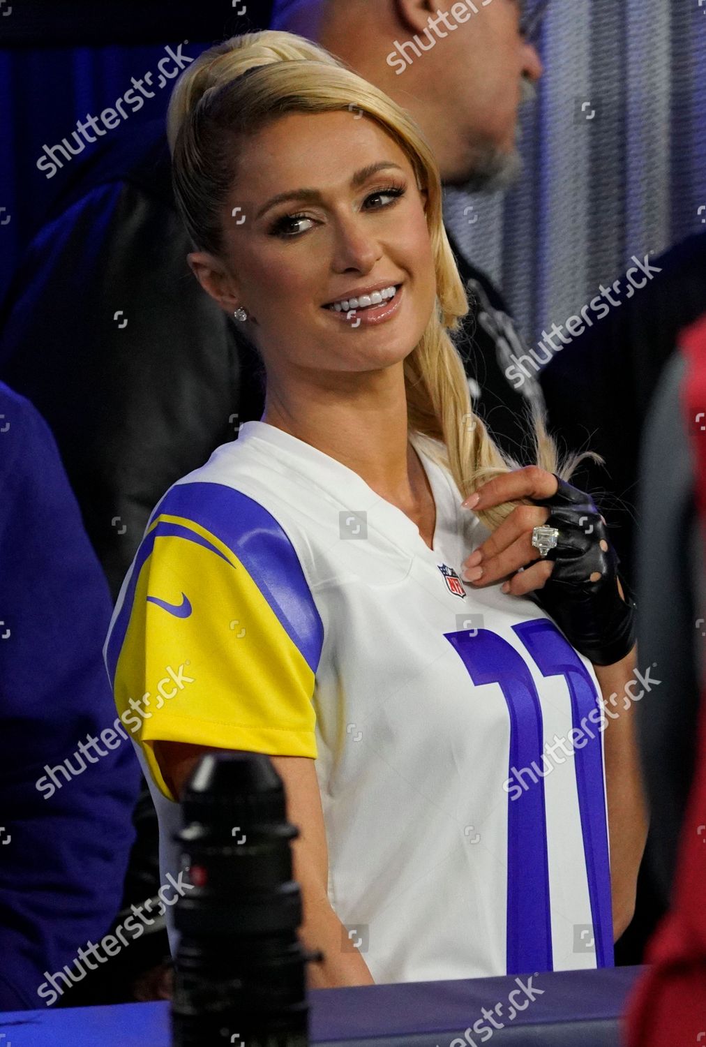 Shutterstock Now - Too cute! Paris Hilton and fiance Carter Reum sport  matching Los Angeles Rams jerseys with the number 11 on it during LA's game  against the Tennessee Titans at SoFi