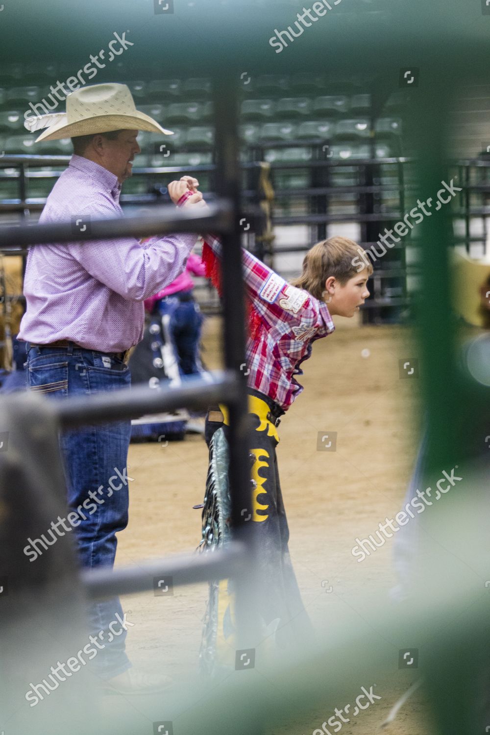 Young Bull Rider Being Stretched During Editorial Stock Photo - Stock ...