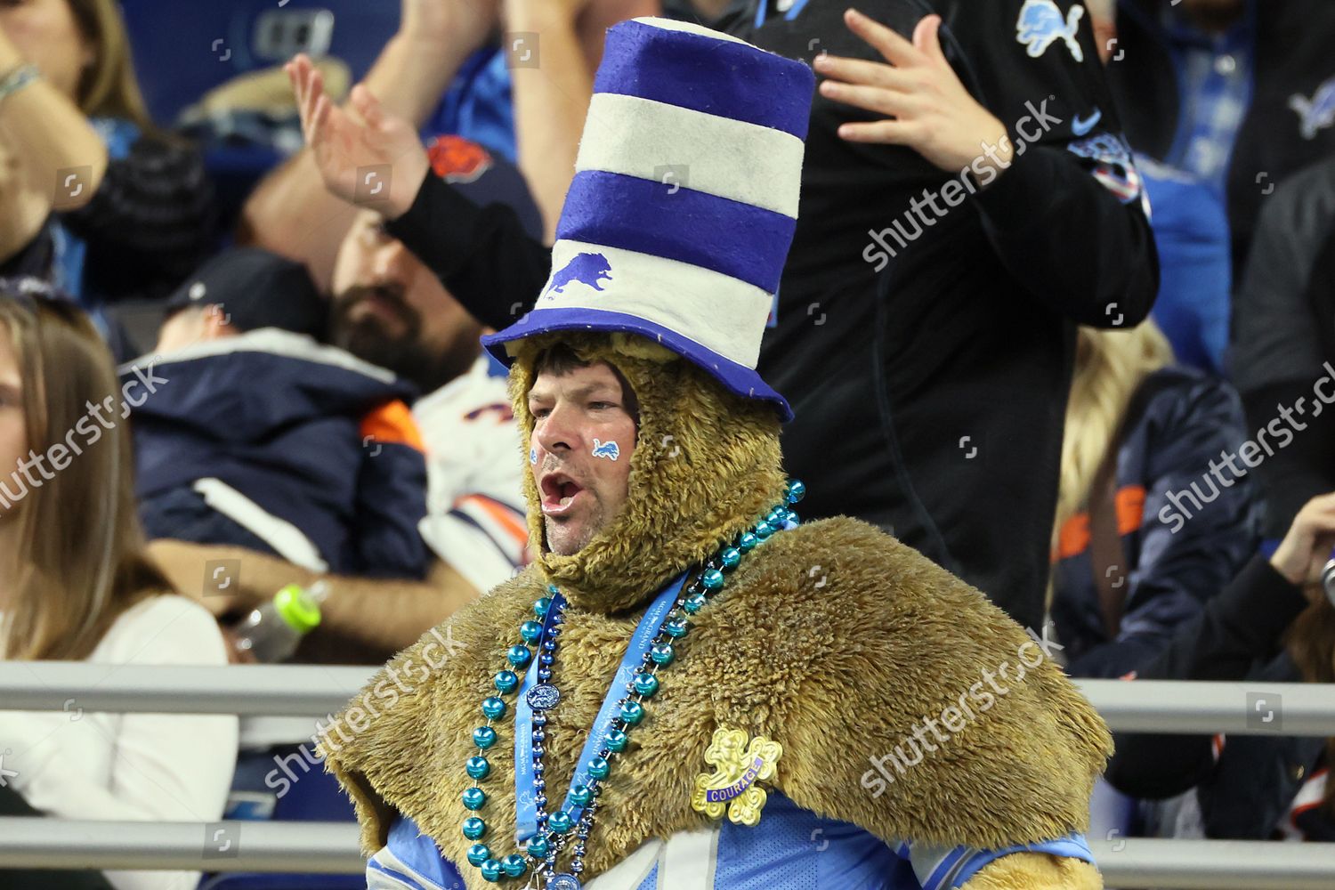 DETROIT, MI - NOVEMBER 25: Fans dress up for Thanksgiving during the game  between the Detroit Lions and the Chicago Bears on Thursday November 25,  2021 at Ford Field in Detroit, MI. (