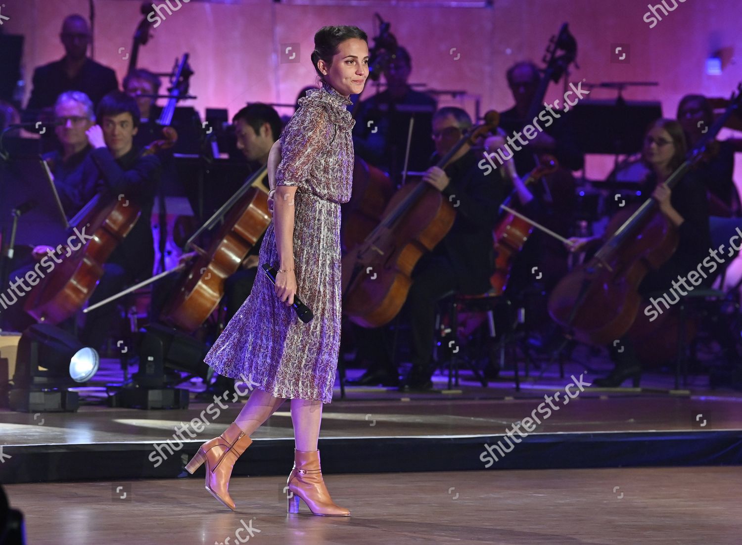 Gothenburg, Sweden. 03rd Dec, 2021. Actress Alicia Vikander, who was  awarded this year's honorary scholarship by the Sten A Olsson Foundation,  dances with her old dance teacher Sebastian Michanek at a gala