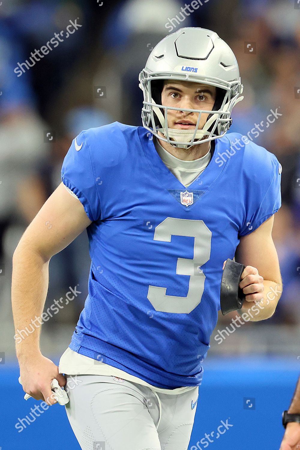 Detroit Lions punter Jack Fox (3) kicks off against the Green Bay