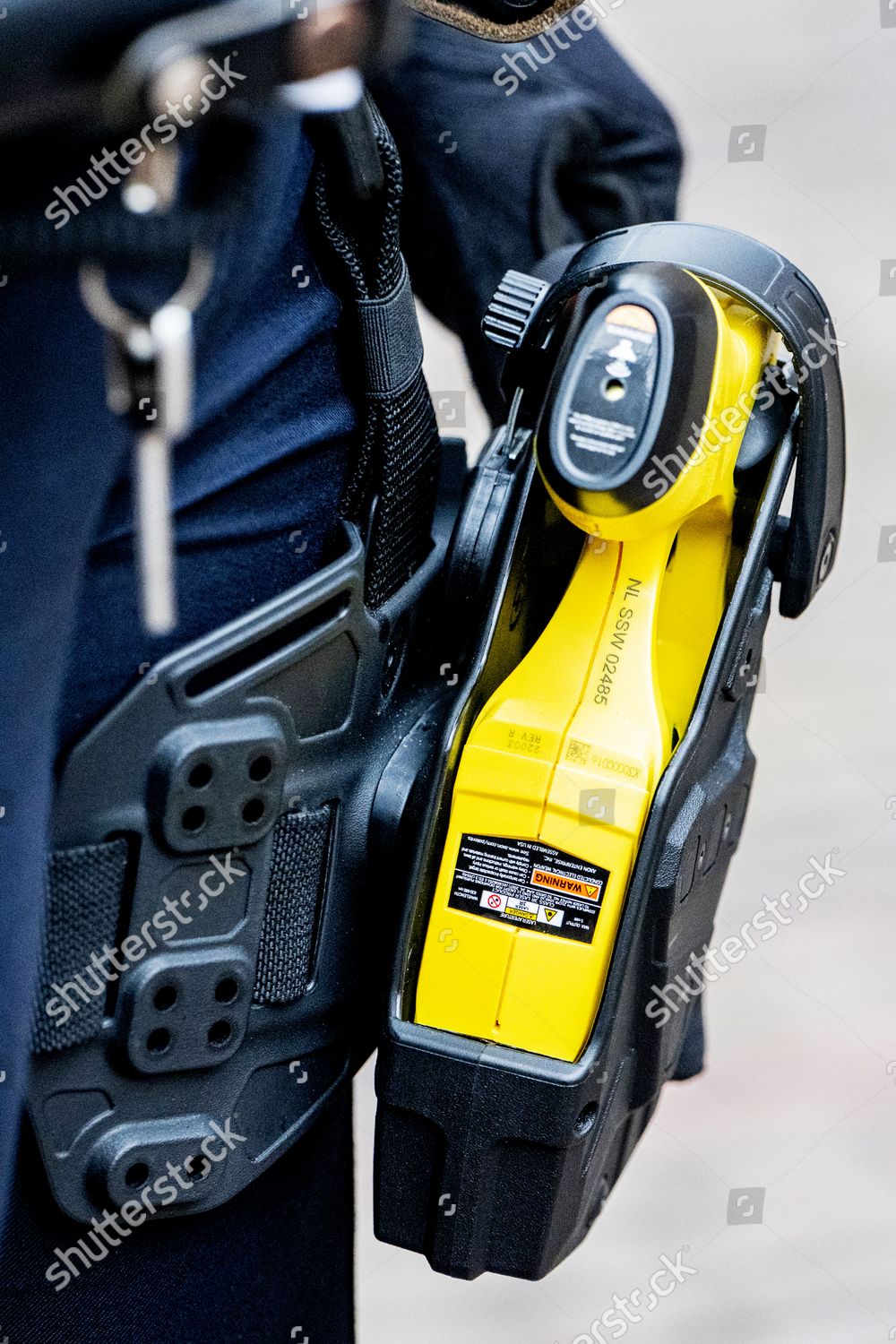 Police Officer Electric Shock Weapon Courtyard Editorial Stock Photo