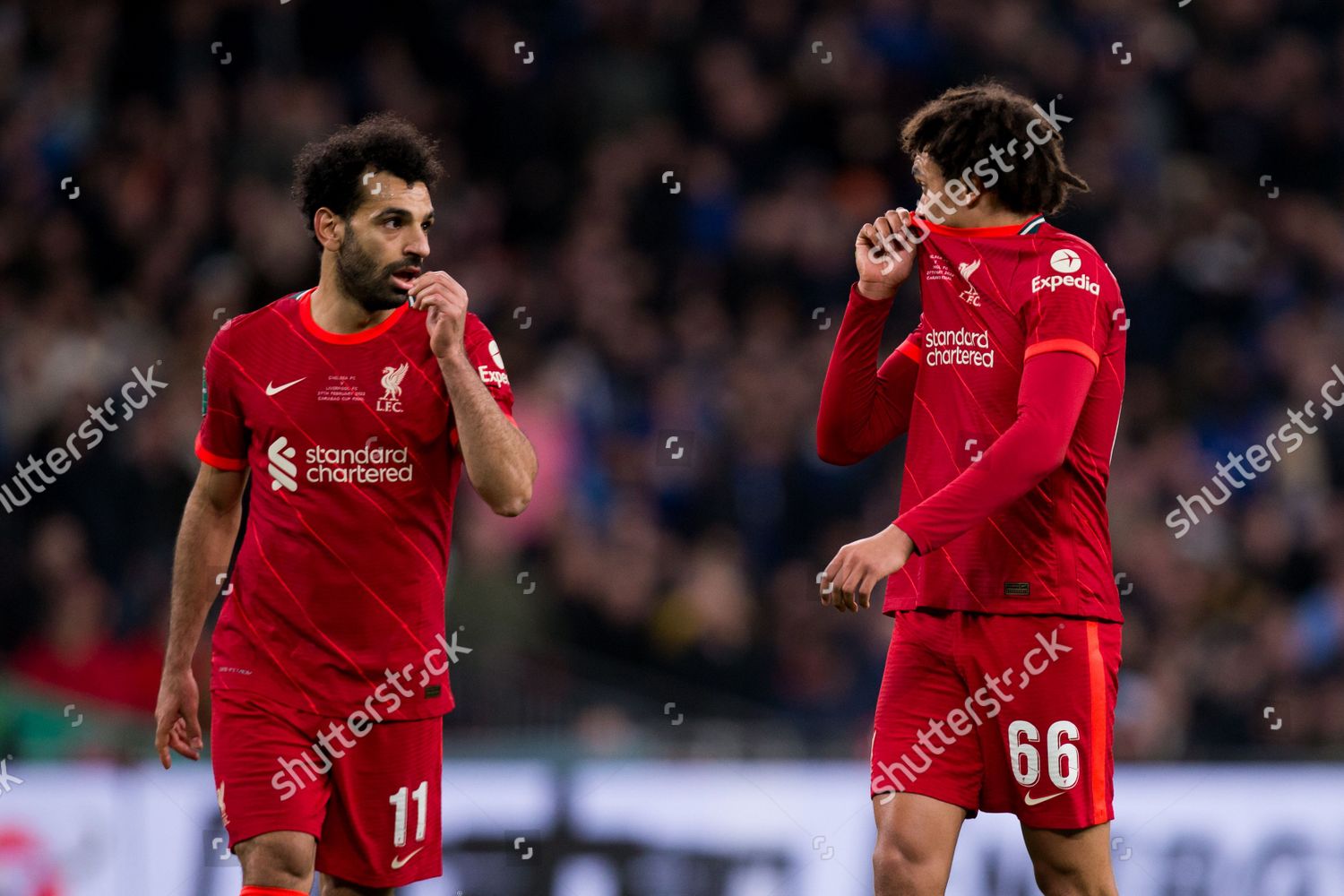  Mohamed Salah and Virgil van Dijk of Liverpool in action during a match against Chelsea, with other players including Trent Alexander-Arnold, Paolo Dybala, Joshua Kimmich, Kevin De Bruyne, Jonathan David, Conor Gallagher, Alphonso Davies, Neymar, Lionel Messi, Weston McKennie, Ferland Mendy, and Lutsharel Geertruida.