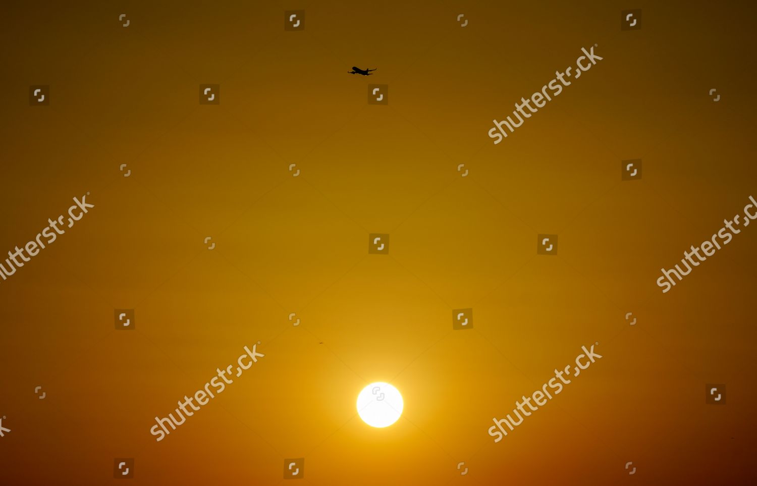 plane-flies-over-sun-after-taking-editorial-stock-photo-stock-image-shutterstock