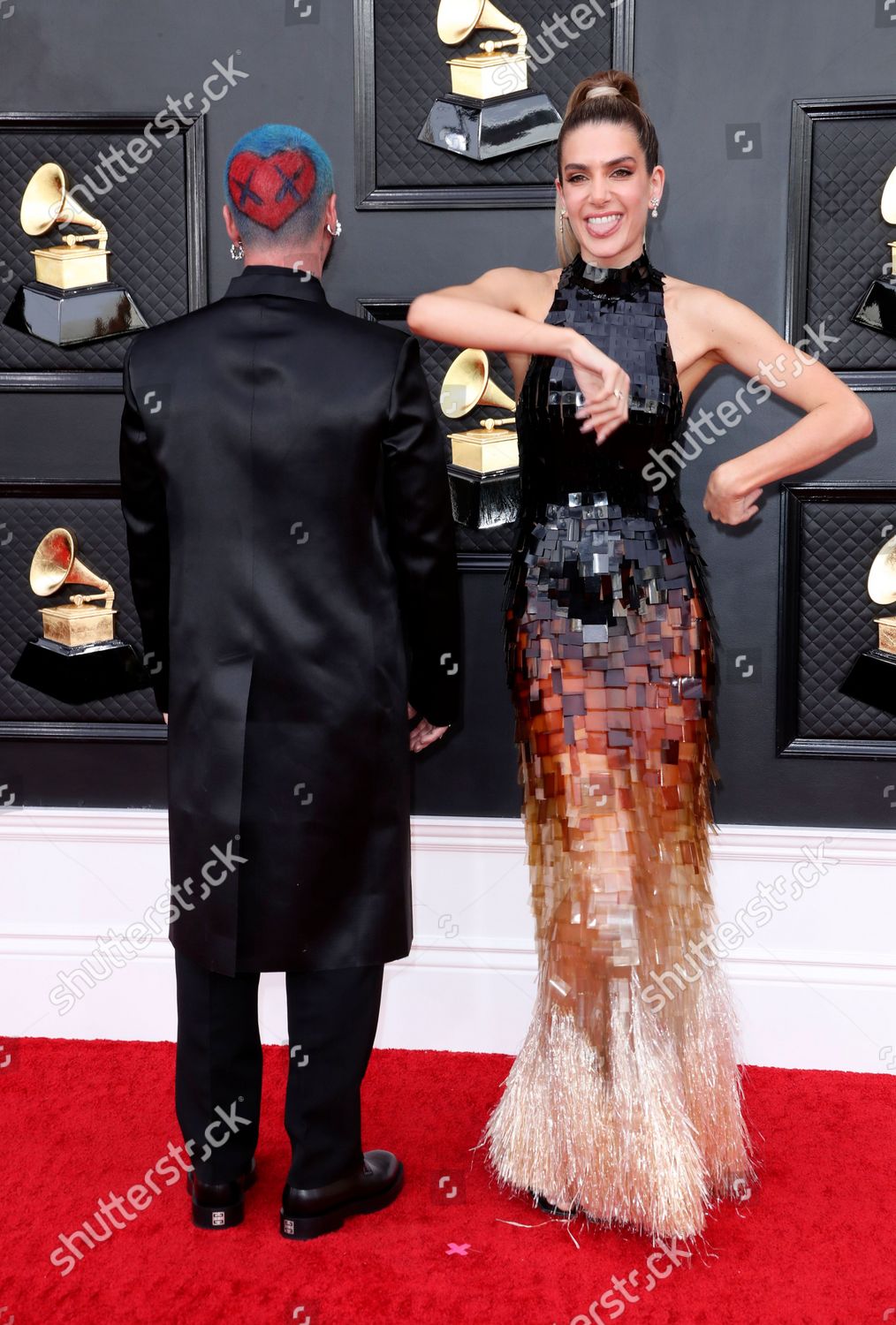 J Balvin and Valentina Ferrer exude style on the 2022 Grammy red carpet