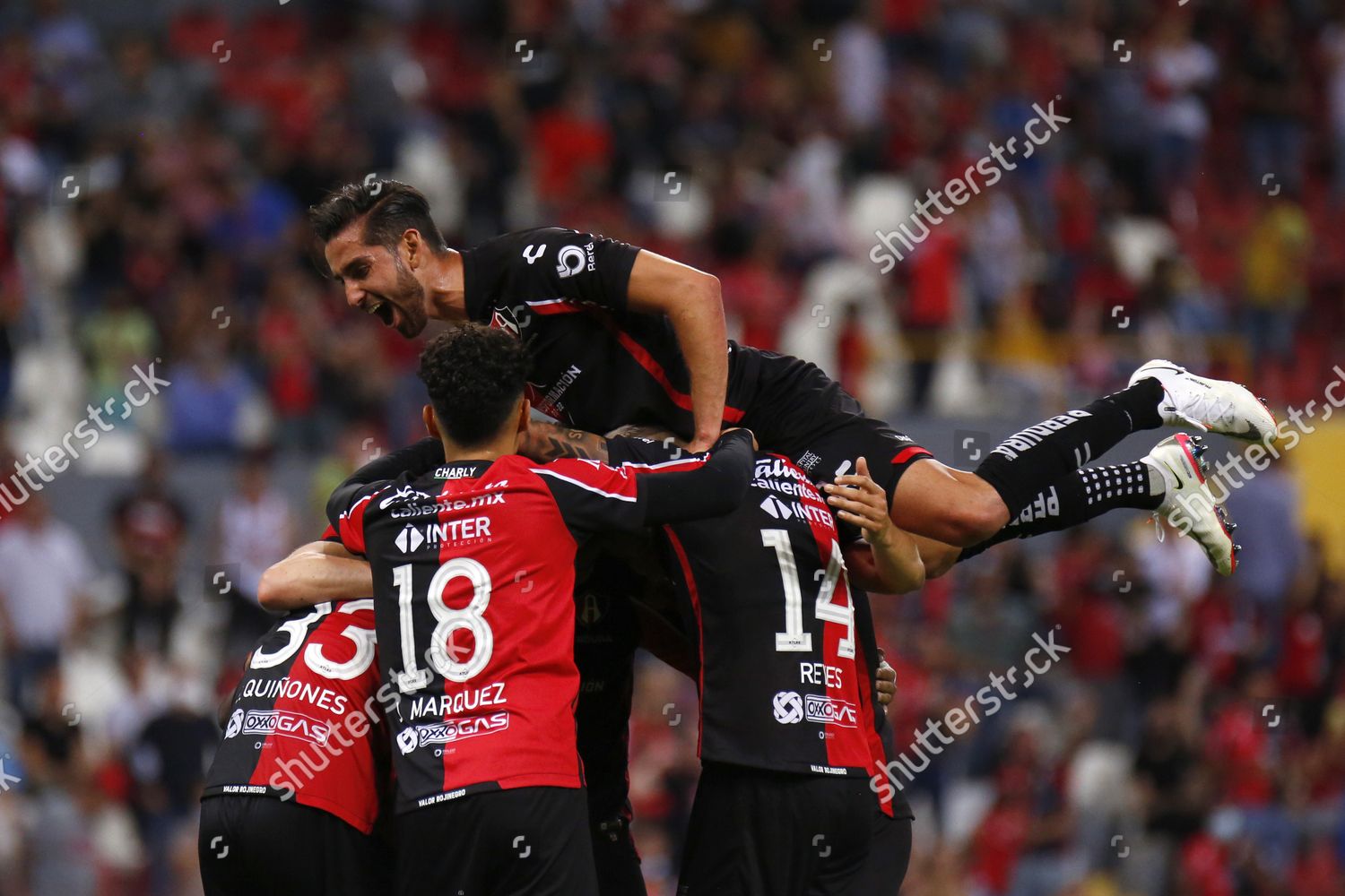 ATLAS' PLAYERS CELEBRATE AFTER SCORING AGAINST Editorial Stock Photo