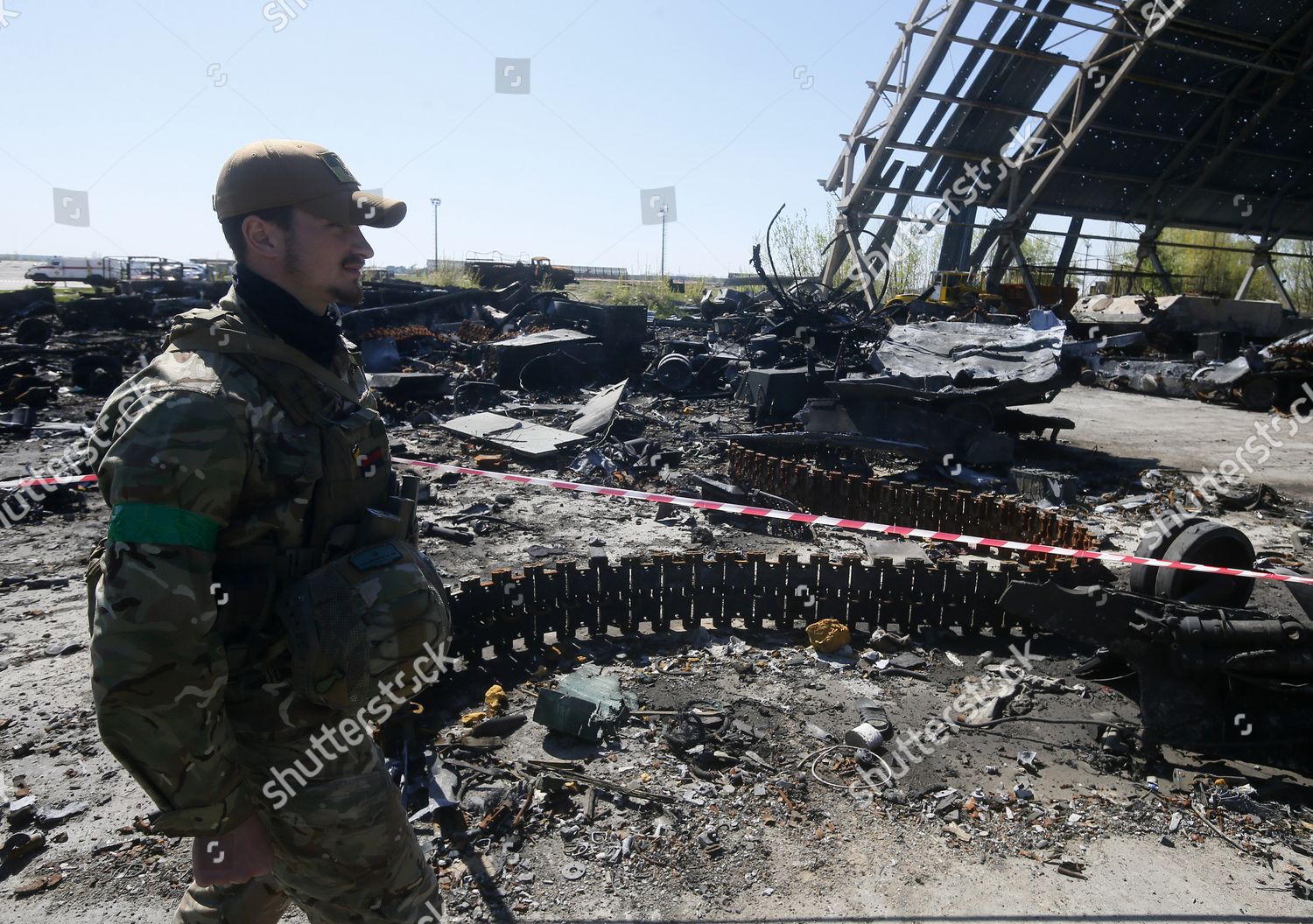 Ukrainian Serviceman Walks Past Destroyed Russian Editorial Stock Photo ...