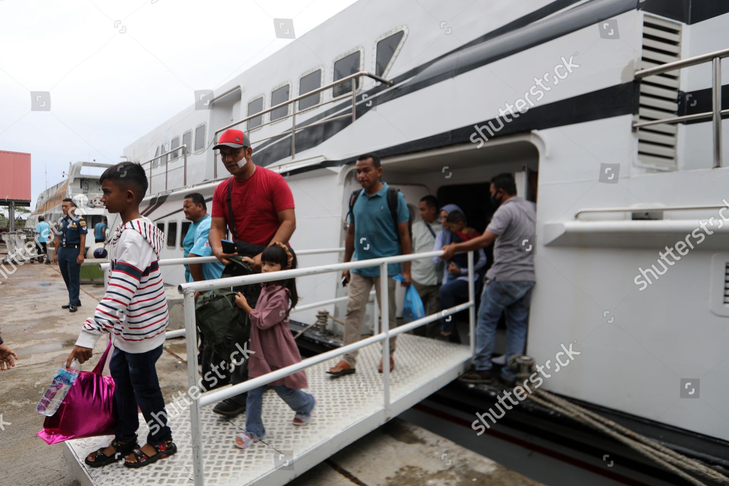 passengers-get-off-ship-during-local-editorial-stock-photo-stock