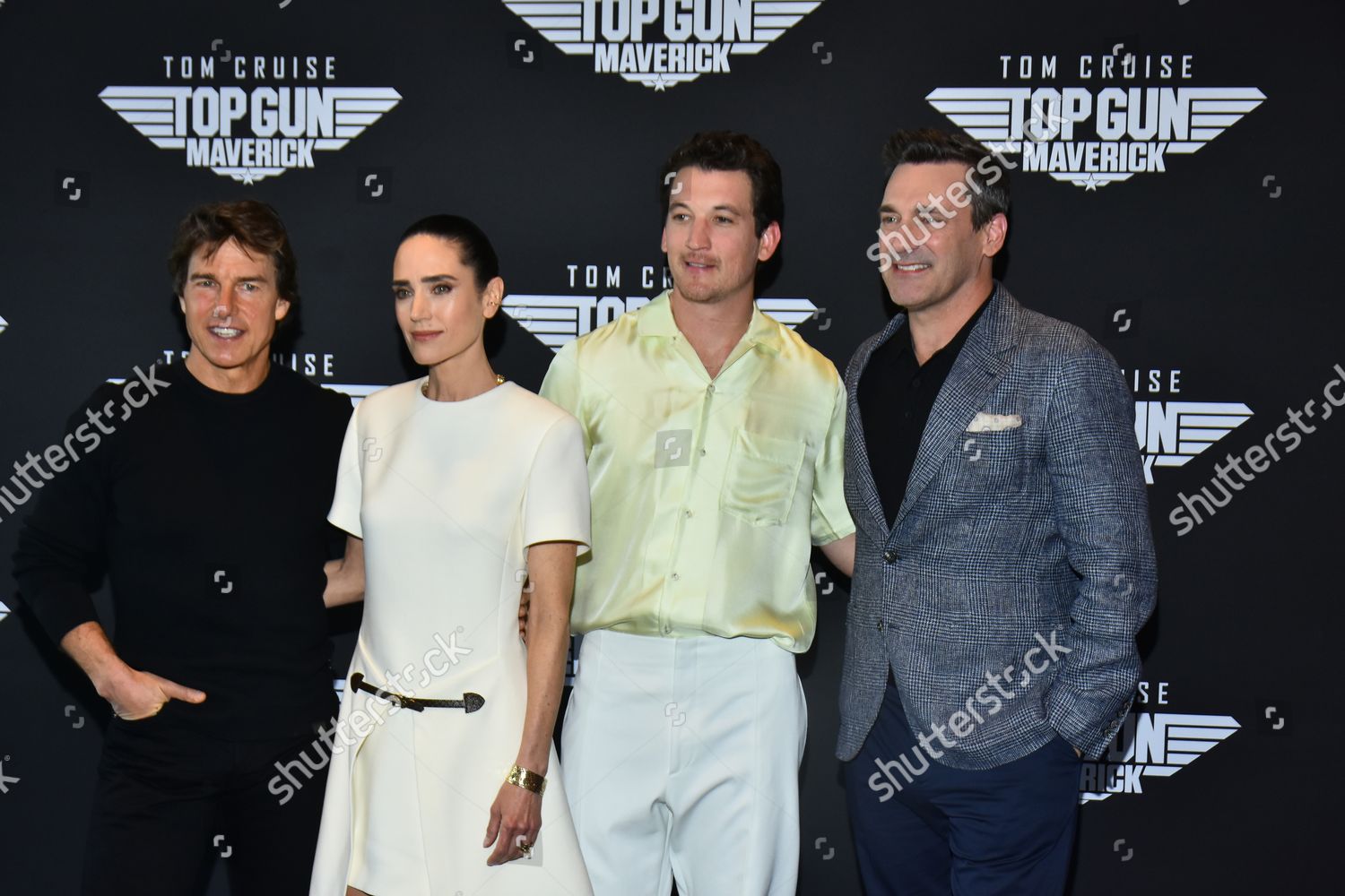 Tom Cruise poses with Jennifer Connelly at a photocall for Top Gun