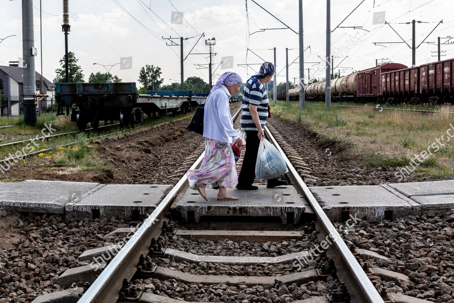 Two Women Walk On Train Tracks Editorial Stock Photo Stock Image