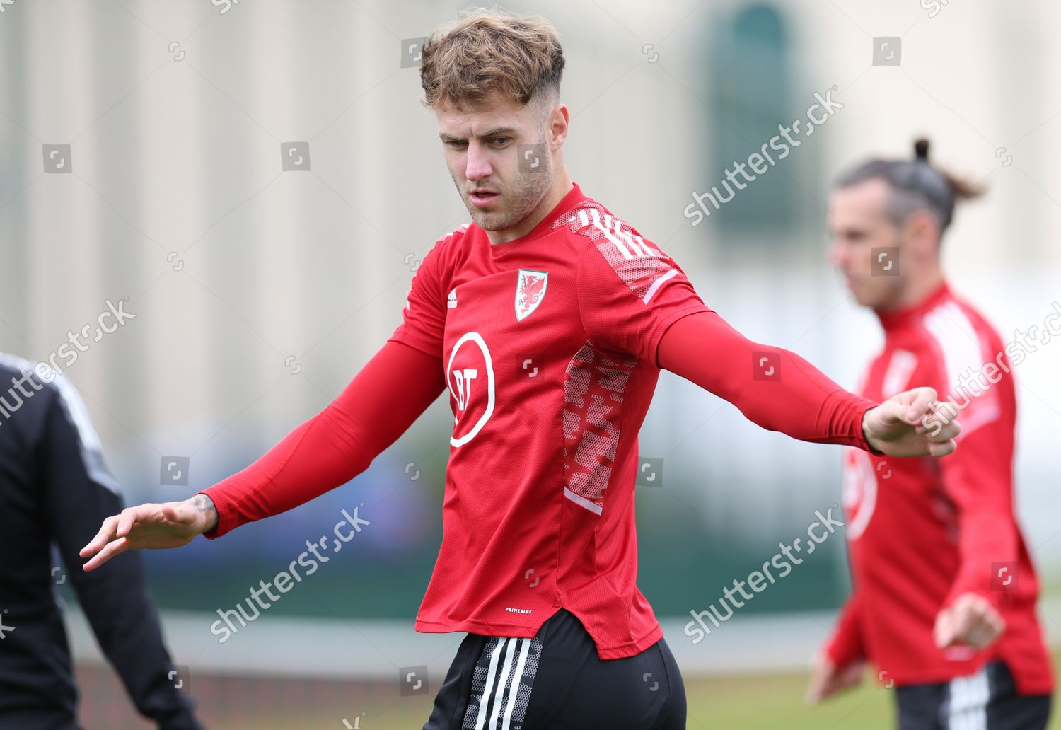 Joe Rodon of Wales speaks to the media ahead of a training session