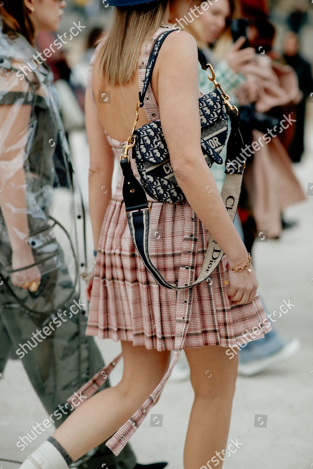 Street style, arriving at Dior Fall-Winter 2022-2023 show, held at