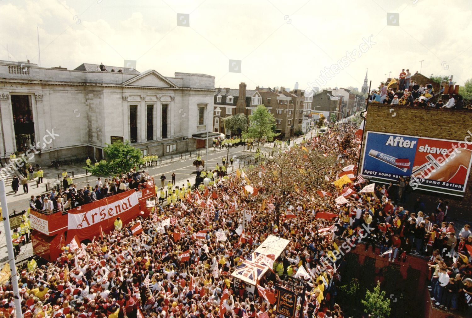 arsenal-victory-parade-the-streets-of-highbury-were-a-sea-of-red-and-white-as-manager-george-graham-and-his-players-paraded-the-european-cup-winners-cup-from-an-open-top-bus-on-the-route-from-highbury-to-islington-arsenal-beat-parma-1-0-shutterstock-editorial-1328825a.jpg