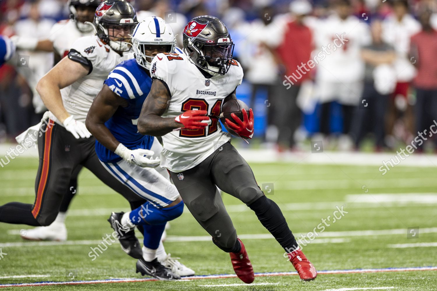 Ke'Shawn Vaughn of the Tampa Bay Buccaneers rushes the ball